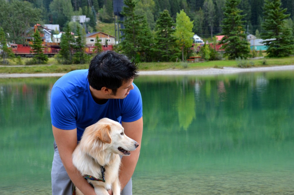 Man and dog by a lake